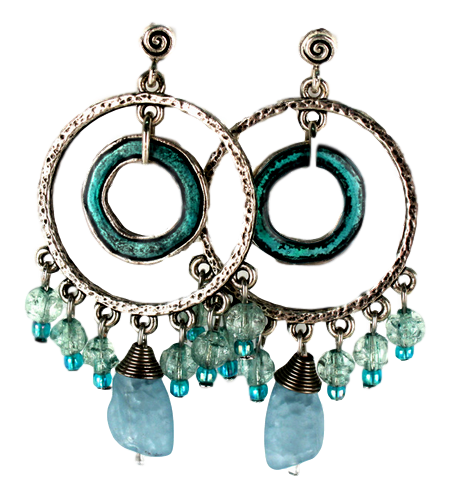 Large silvered hoop earrings with turquoise accents.