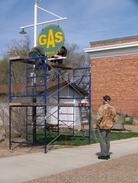 Installing Empress gas sign