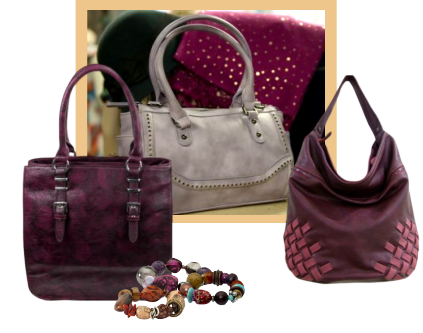 An assortment of handbags in shades of purple and mauve.